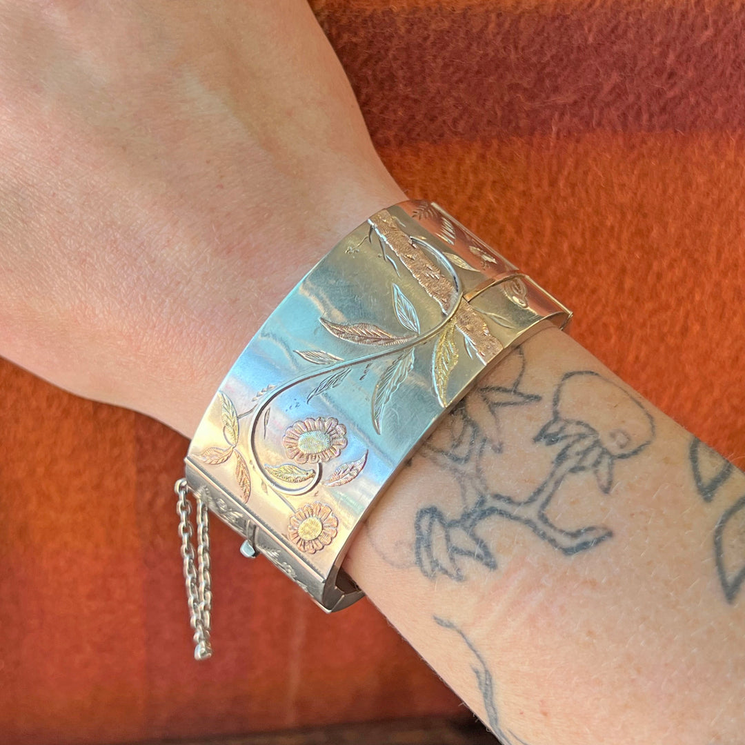 Antique Victorian Silver Aesthetic Bangle with Bird and Floral Motif, c. 1880