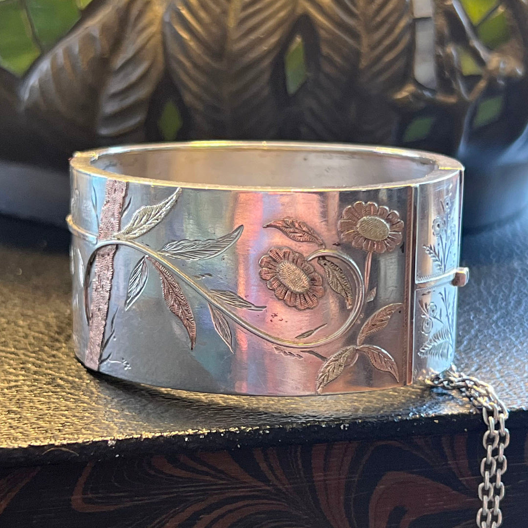 Antique Victorian Silver Aesthetic Bangle with Bird and Floral Motif, c. 1880