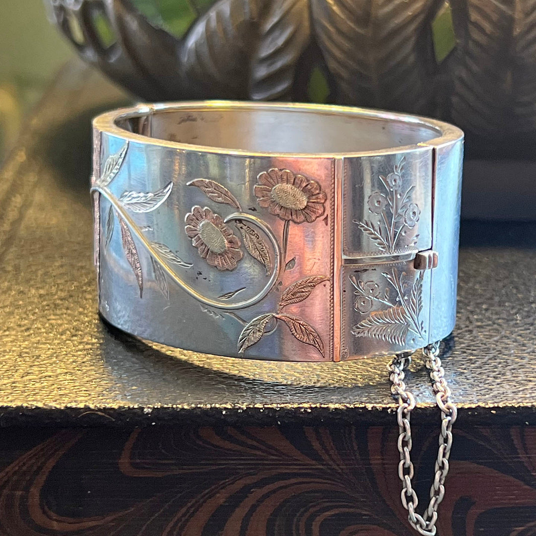 Antique Victorian Silver Aesthetic Bangle with Bird and Floral Motif, c. 1880
