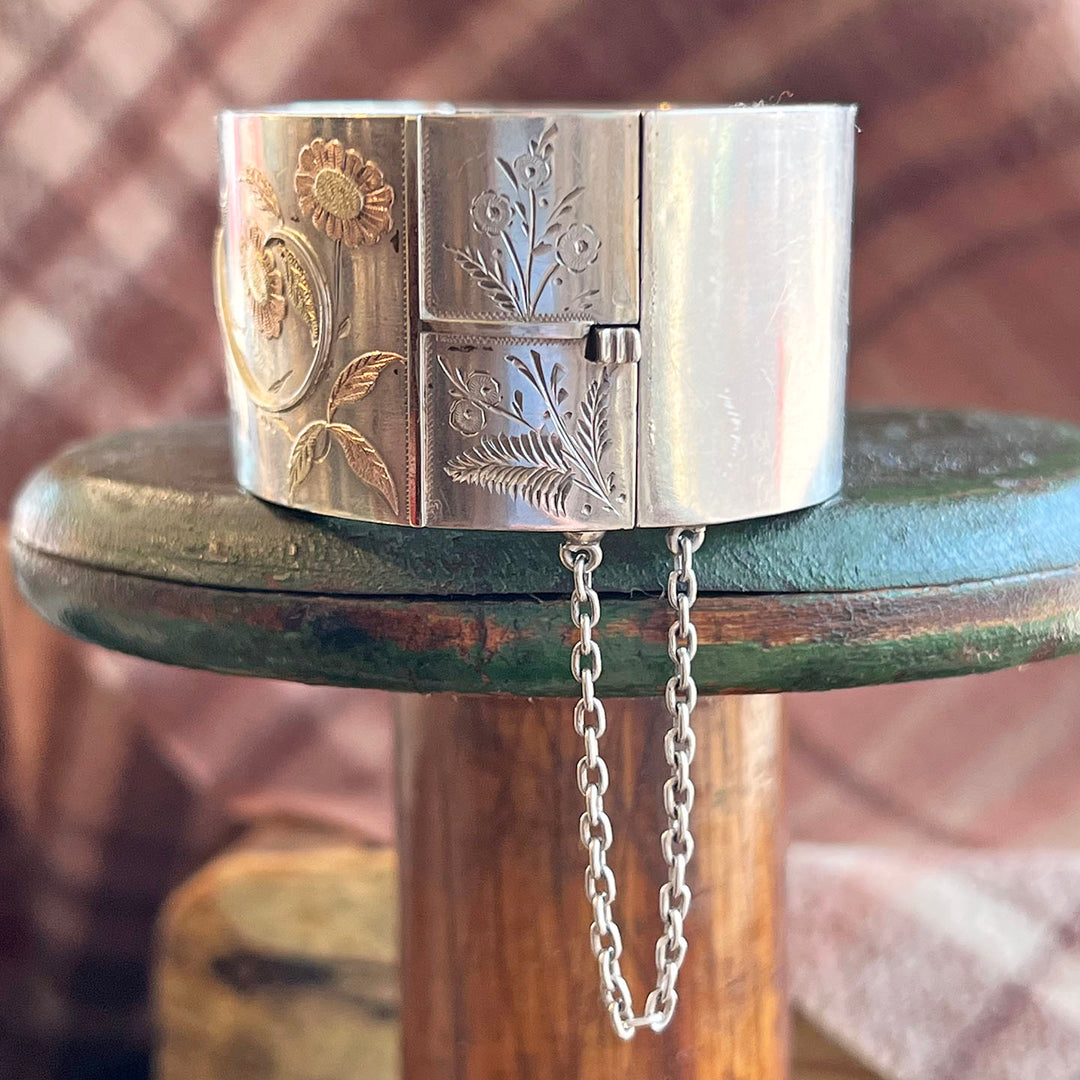 Antique Victorian Silver Aesthetic Bangle with Bird and Floral Motif, c. 1880