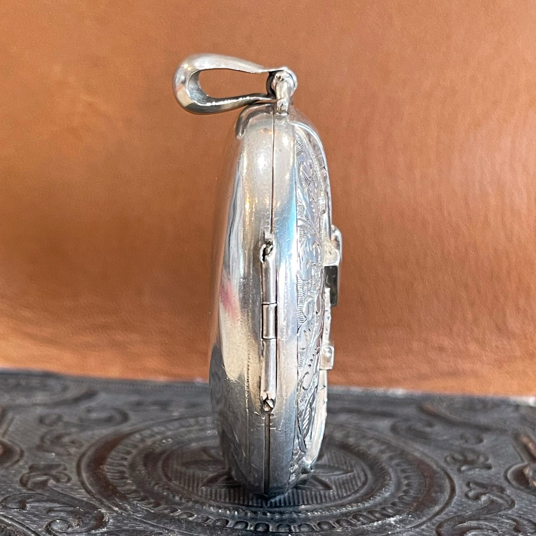 Silver Embossed Oval Buckle Locket Hallmarked 1883