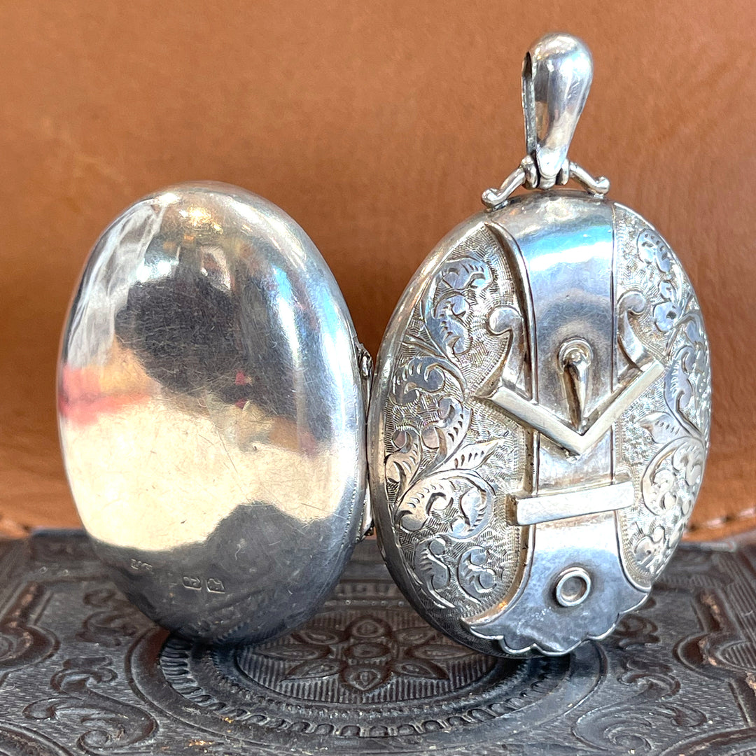 Silver Embossed Oval Buckle Locket Hallmarked 1883