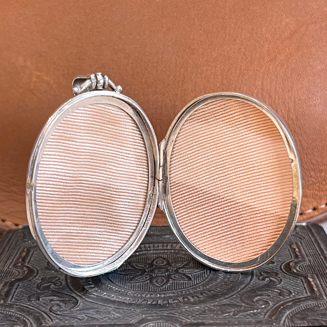 Silver Embossed Oval Buckle Locket Hallmarked 1883