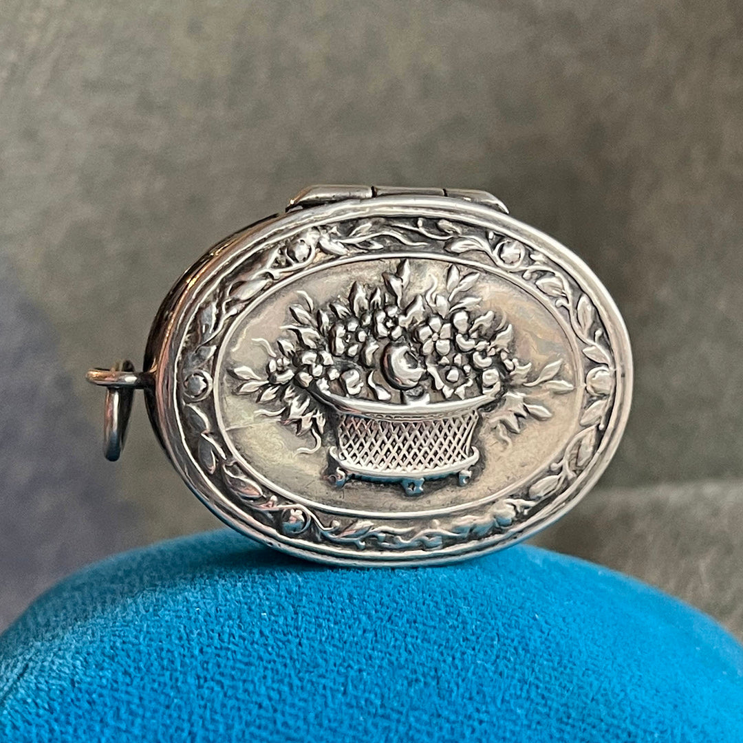 Antique Silver Repoussé Pill Box Pendant with Basket of Flowers, c. 1890