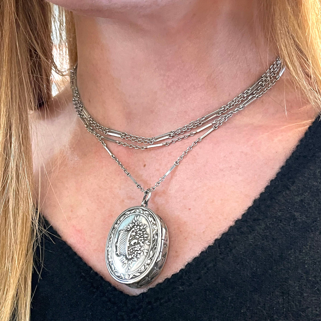 Antique Silver Repoussé Pill Box Pendant with Basket of Flowers, c. 1890