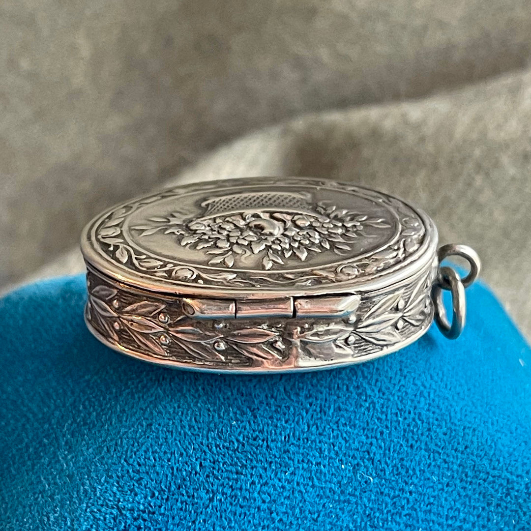 Antique Silver Repoussé Pill Box Pendant with Basket of Flowers, c. 1890