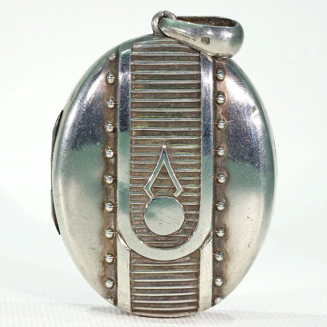 Victorian Embossed Silver Locket Button Design