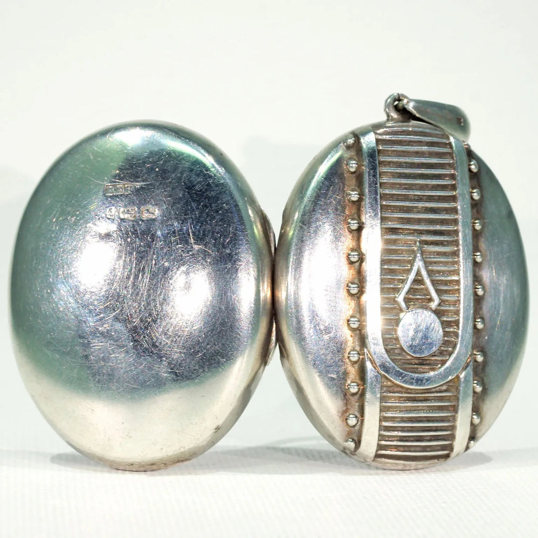 Victorian Embossed Silver Locket Button Design