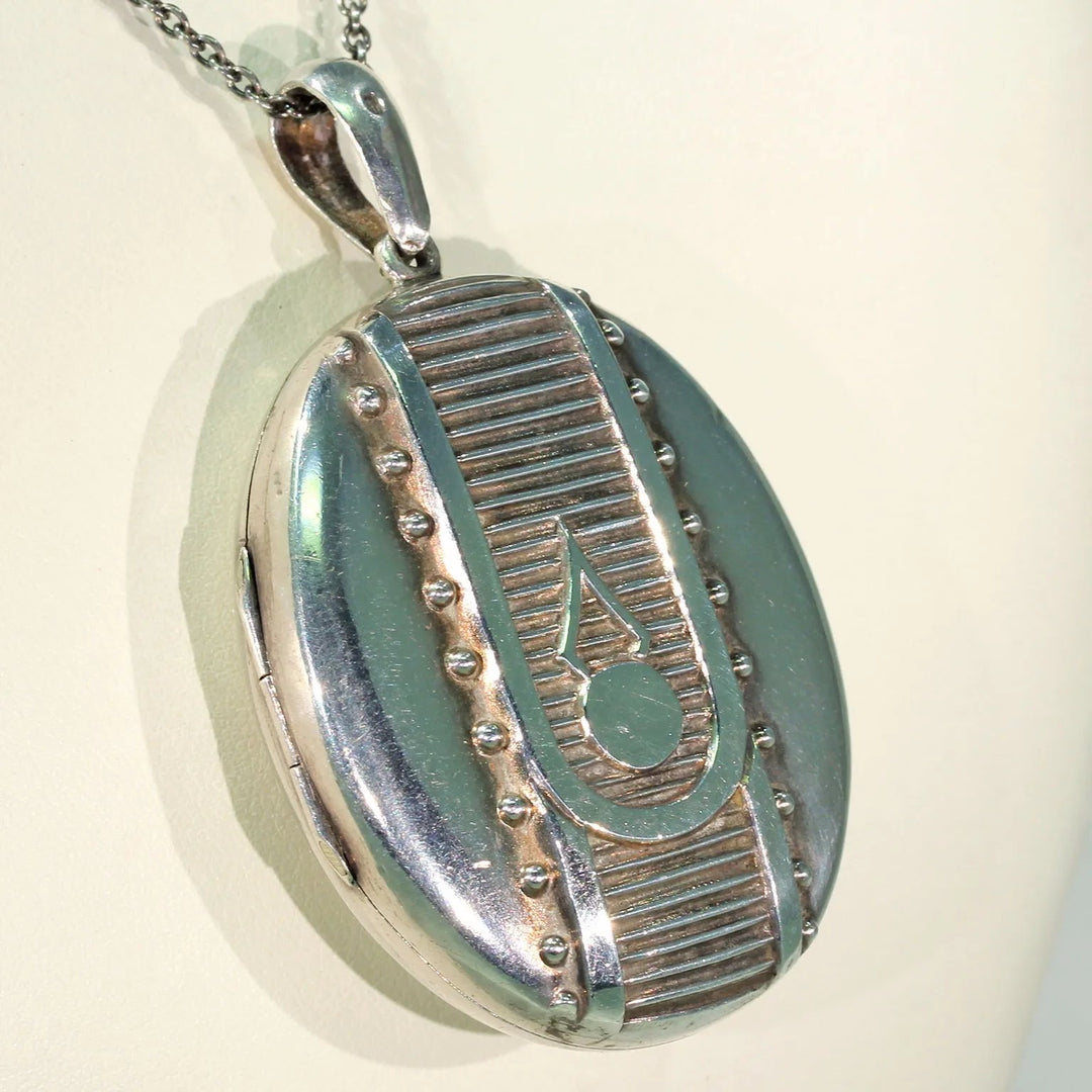 Victorian Embossed Silver Locket Button Design