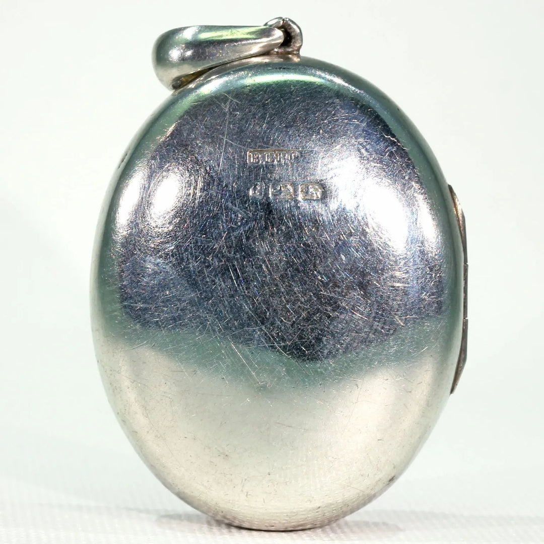 Victorian Embossed Silver Locket Button Design