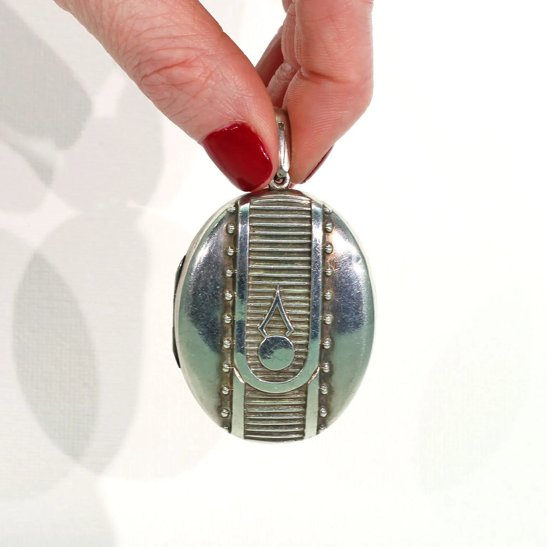 Victorian Embossed Silver Locket Button Design