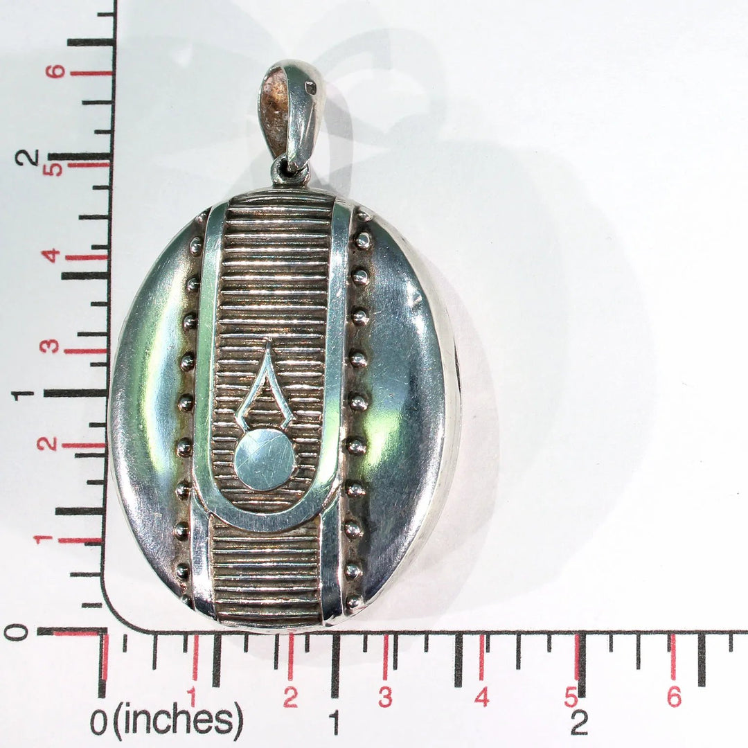 Victorian Embossed Silver Locket Button Design