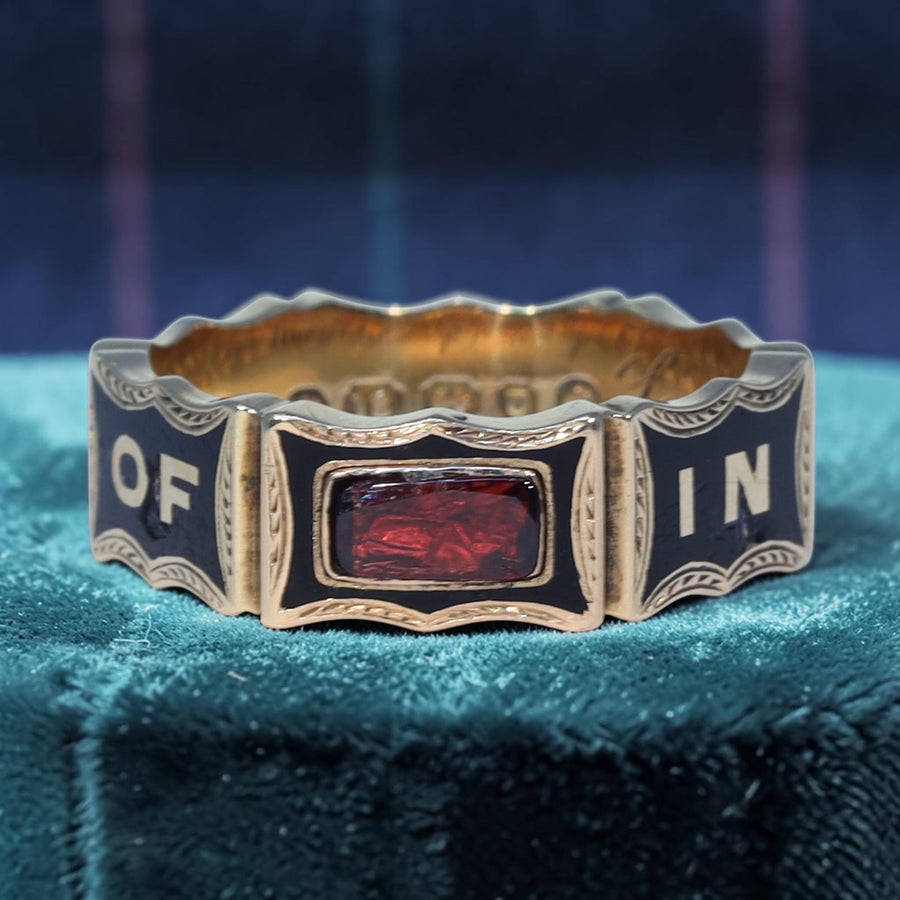 Antique Victorian 18 karat gold enamel garnet mourning ring