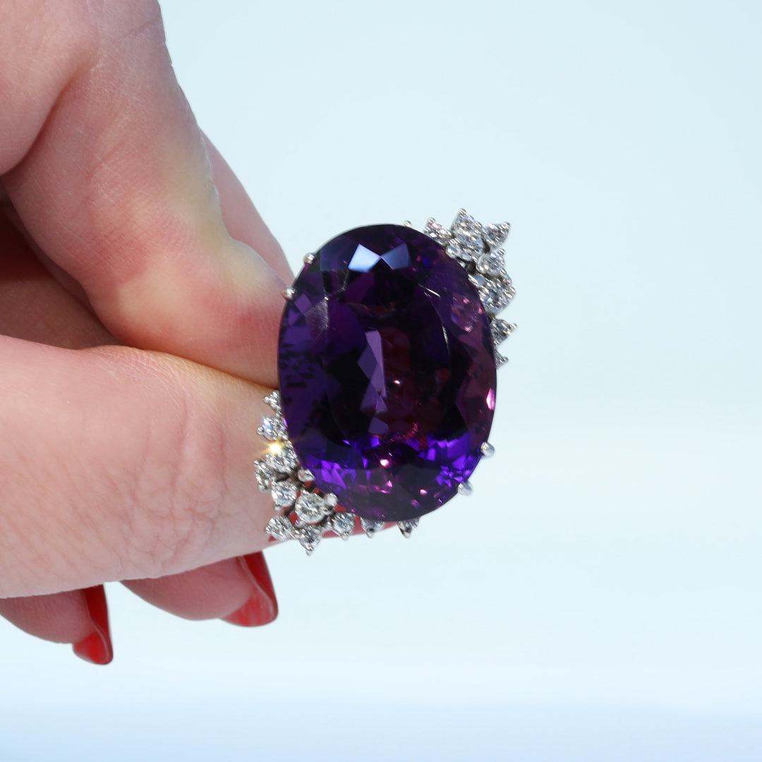 Deep violet amethyst statement ring with .95 carats of diamonds
