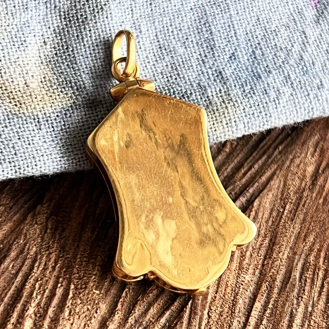 Elegant antique gold locket pendant