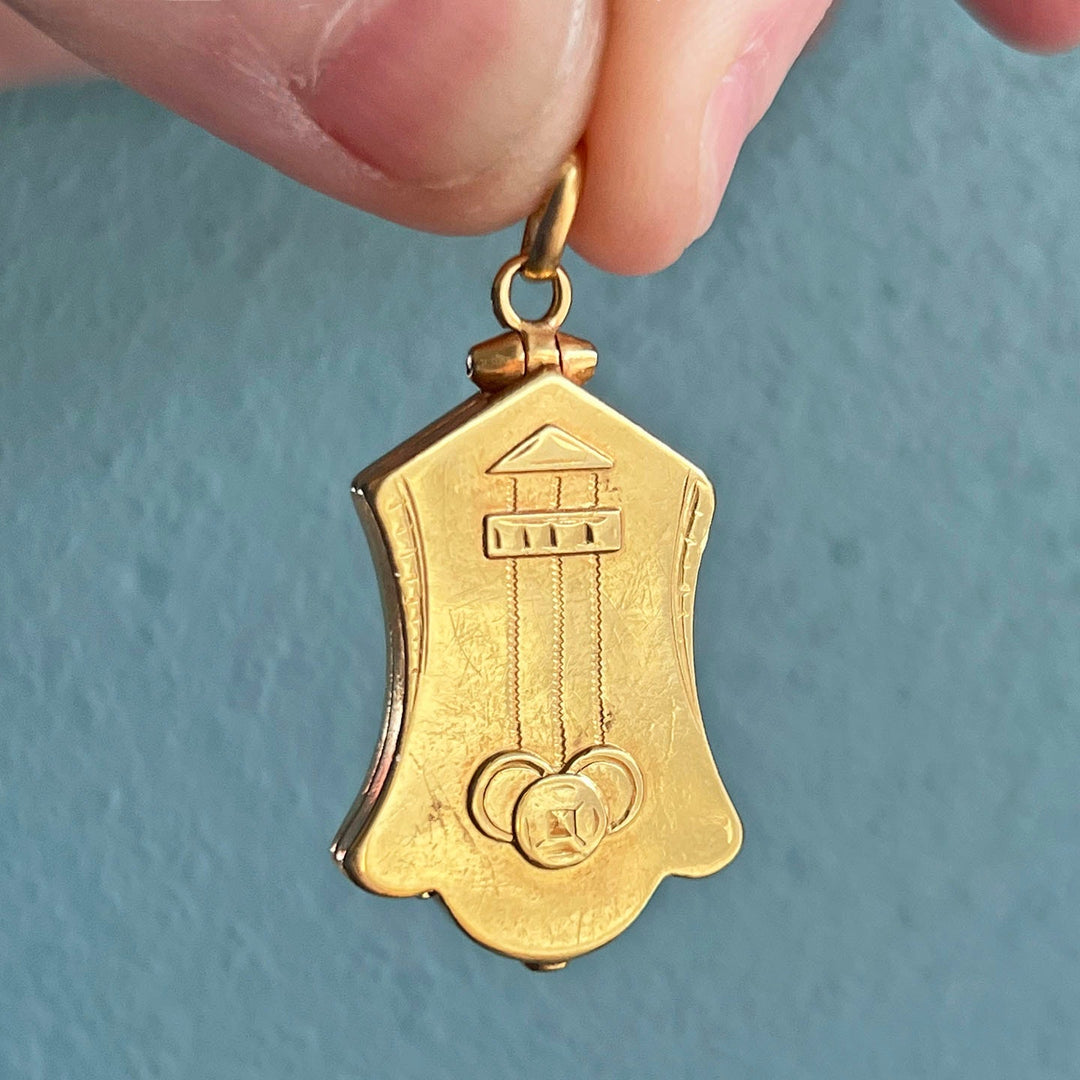 Close view of Art Deco gold locket details