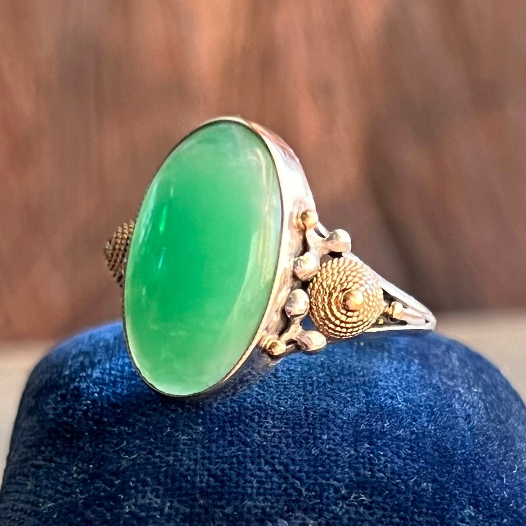 Side profile of antique silver jade ring