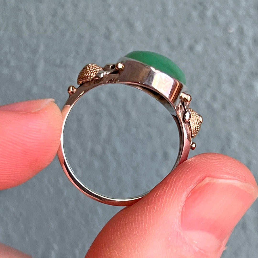 Side profile of antique silver jade ring