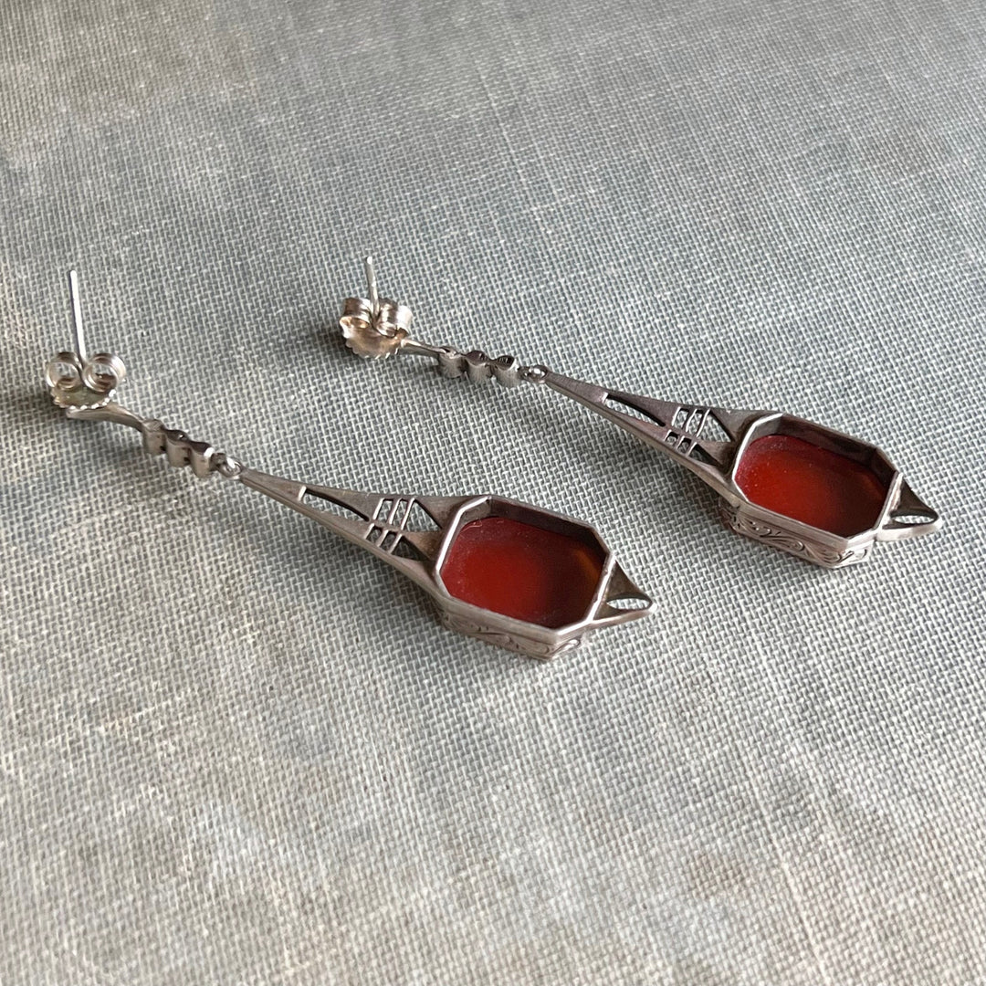 Vintage silver earrings with orange gemstones