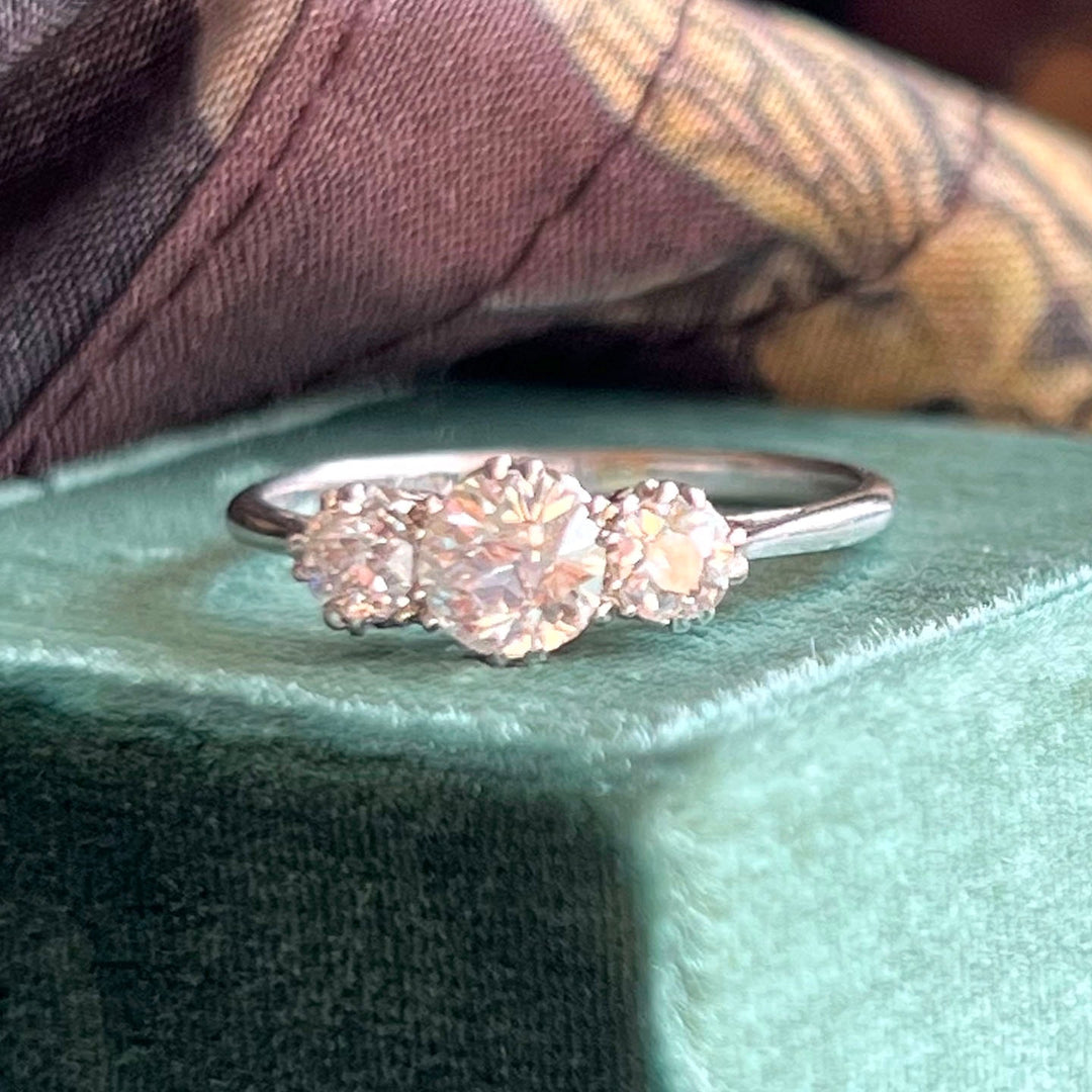 Antique Art Deco three stone diamond ring in platinum circa 1920