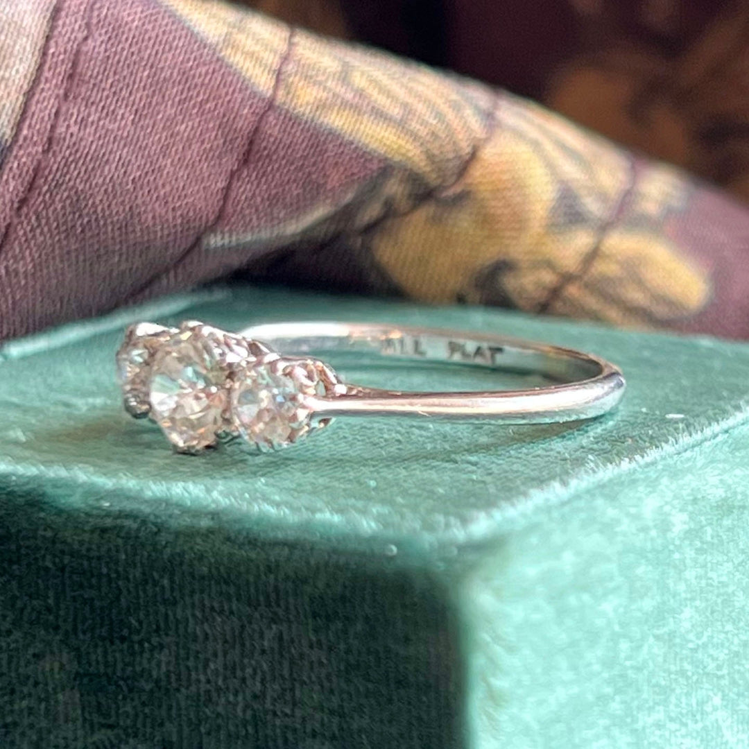 Antique Art Deco three stone diamond ring in platinum circa 1920