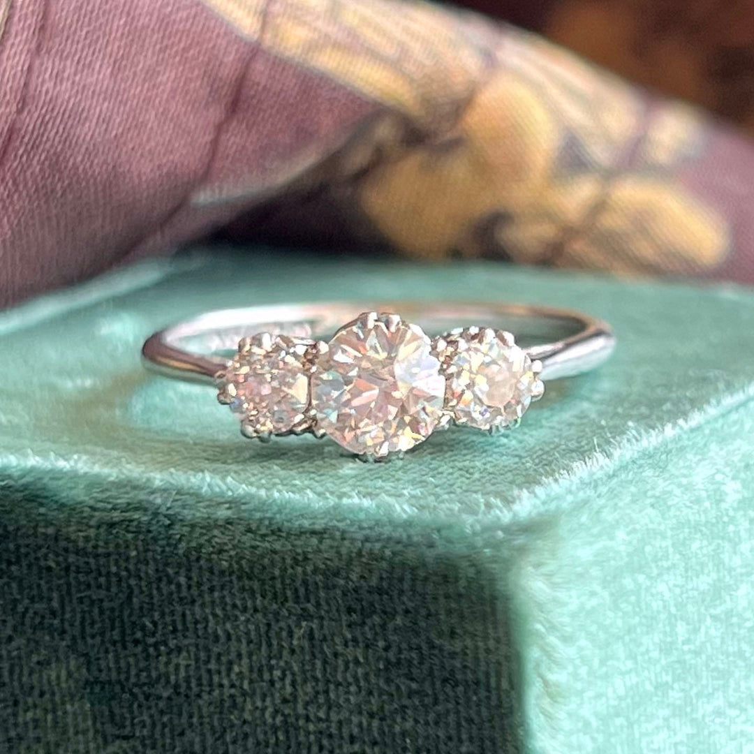 Antique Art Deco three stone diamond ring in platinum circa 1920