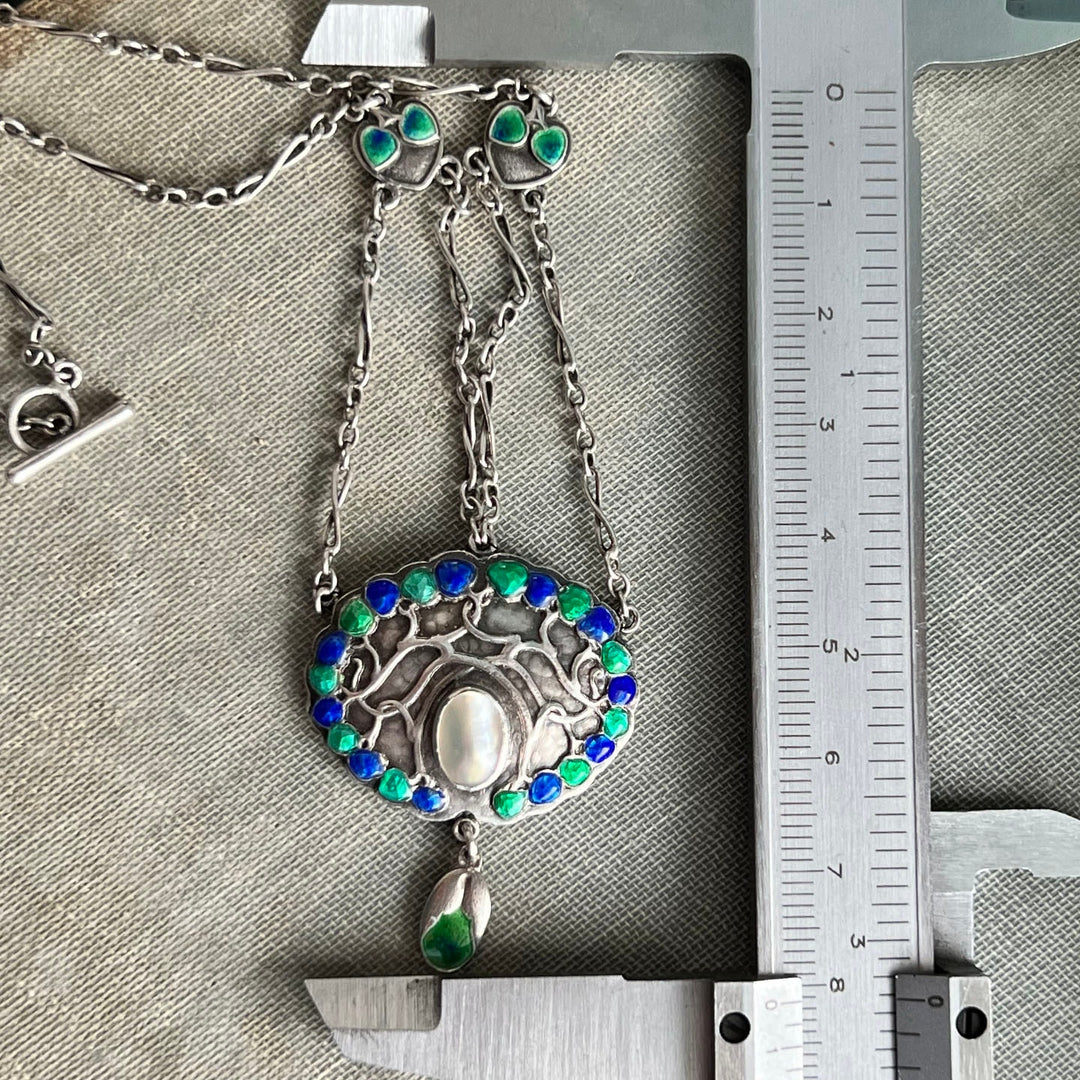 Art Nouveau silver necklace flowing motif