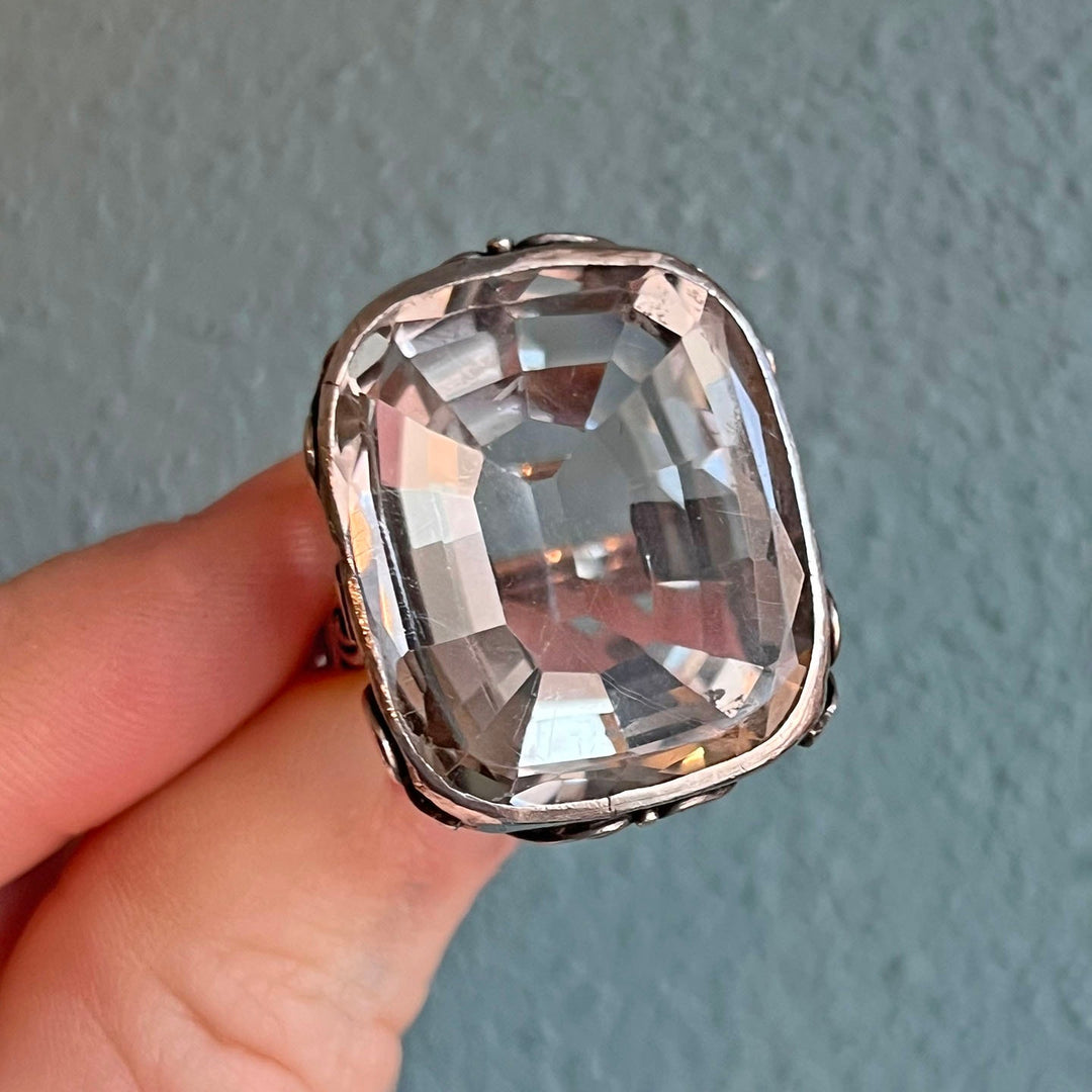 Close view of luminous crystal silver ring