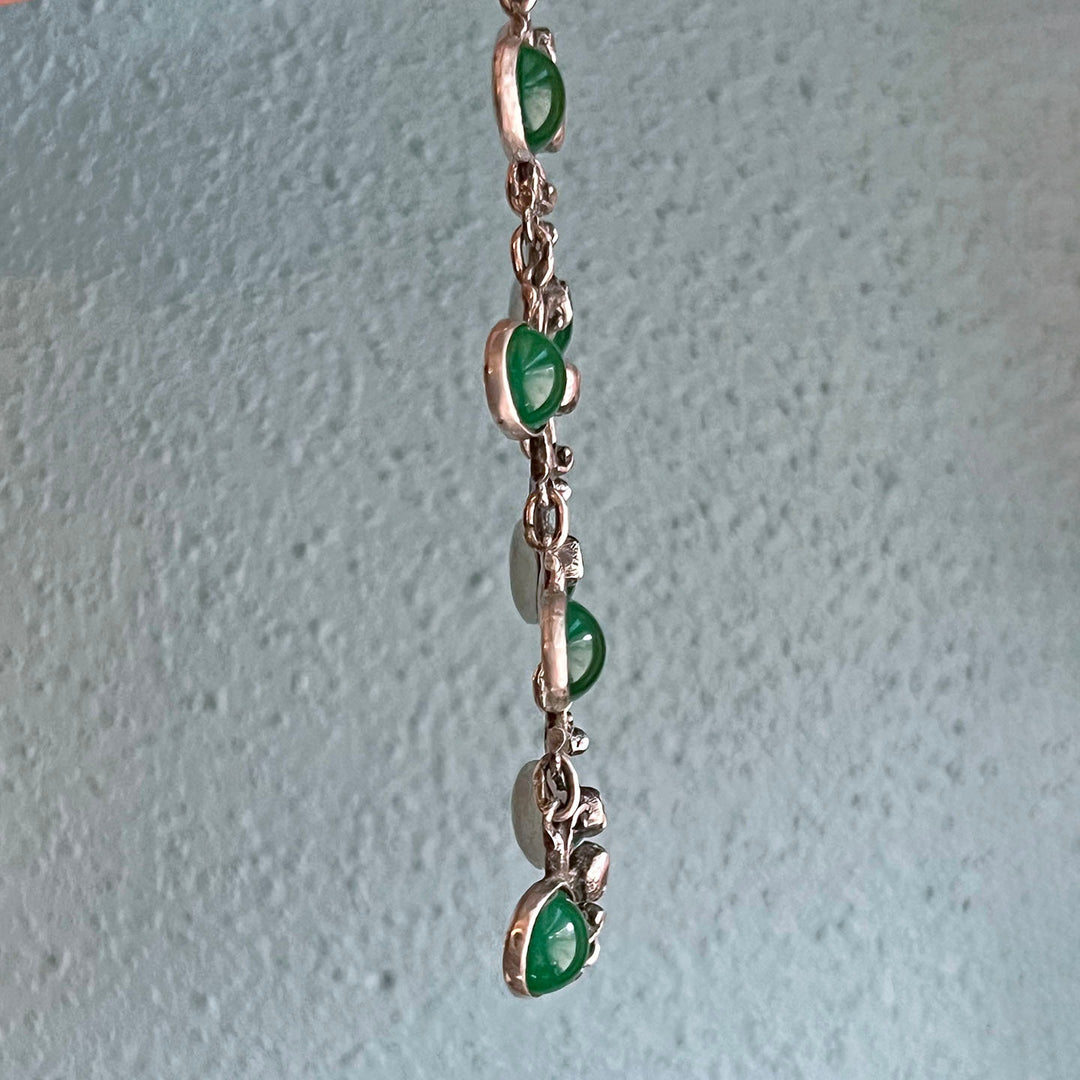 Side profile of antique green glass necklace