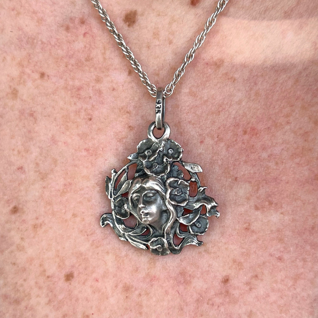 Antique female portrait pendant