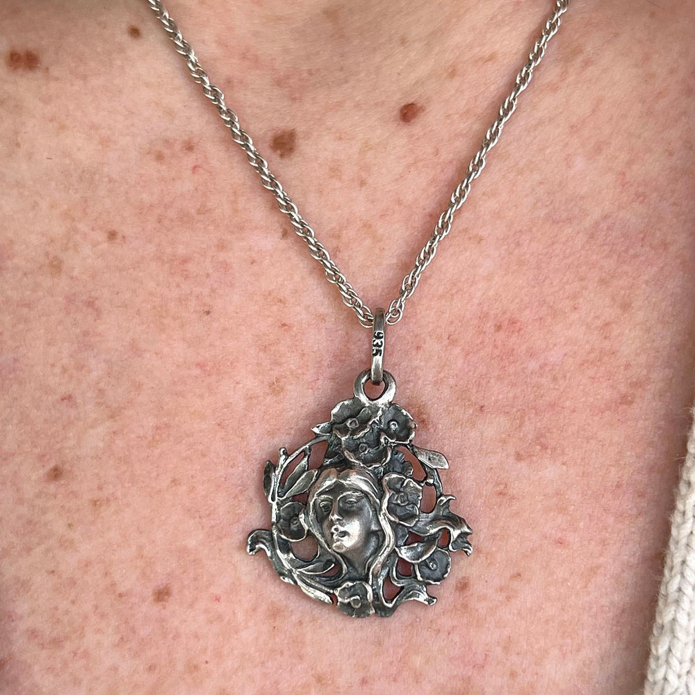 Art Nouveau silver woman profile pendant