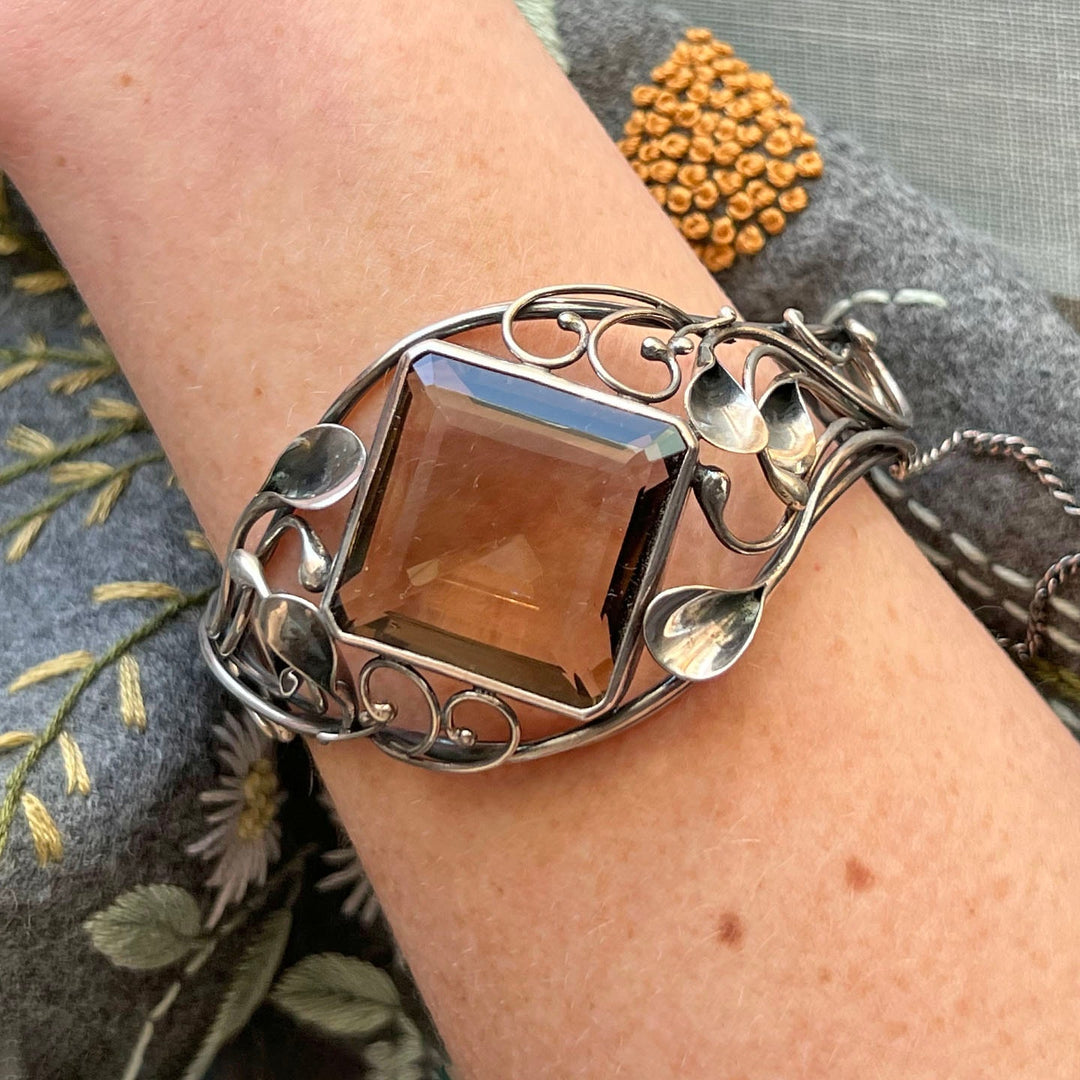 Handcrafted Arts and Crafts silver bracelet