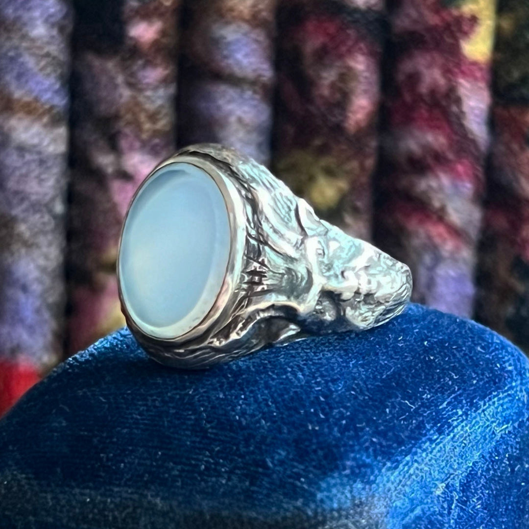 Close view of chalcedony gemstone and silver details