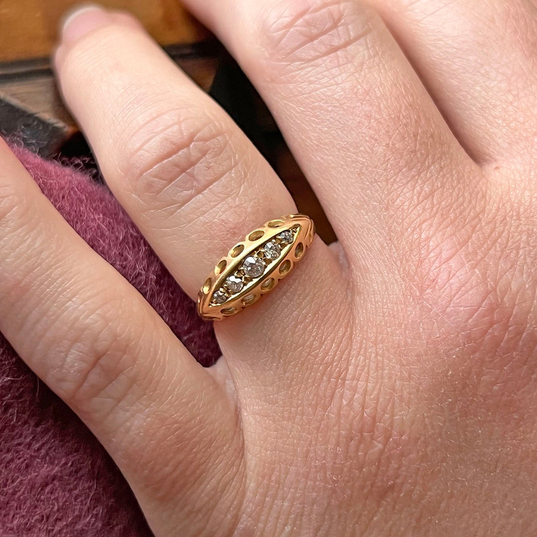Edwardian diamond boat ring worn on hand antique five stone design