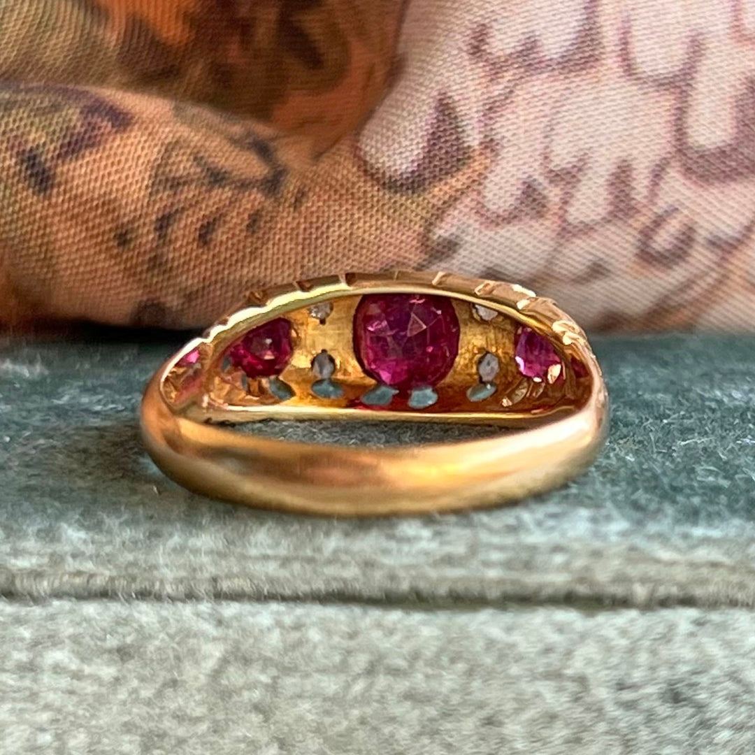 Estate seven stone ruby and diamond ring detail