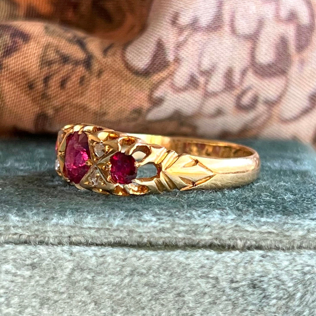 Vintage Edwardian ruby and diamond seven stone ring close up