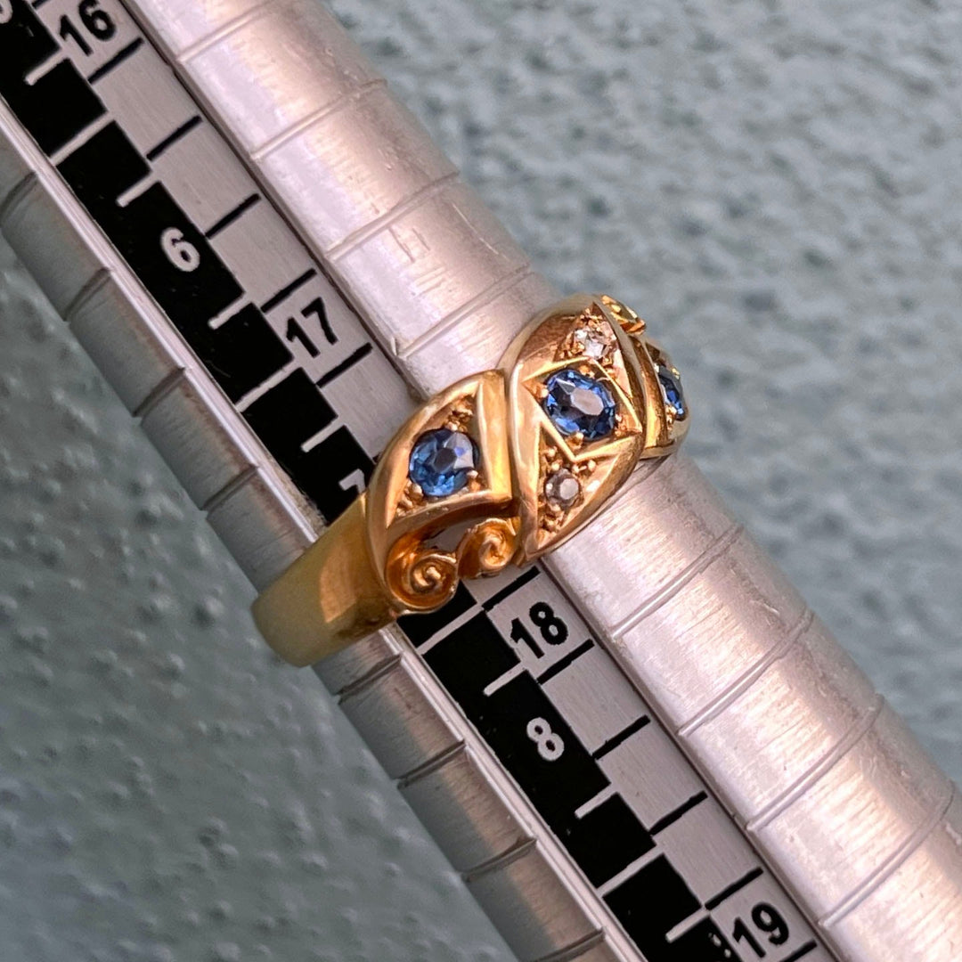 Close up sapphire and diamond gemstone settings