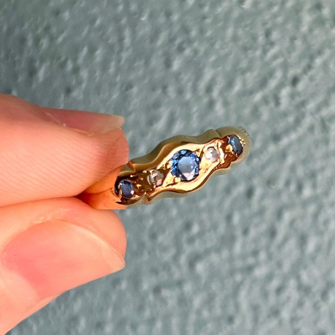 Close up sapphire and old cut diamond Edwardian five stone ring