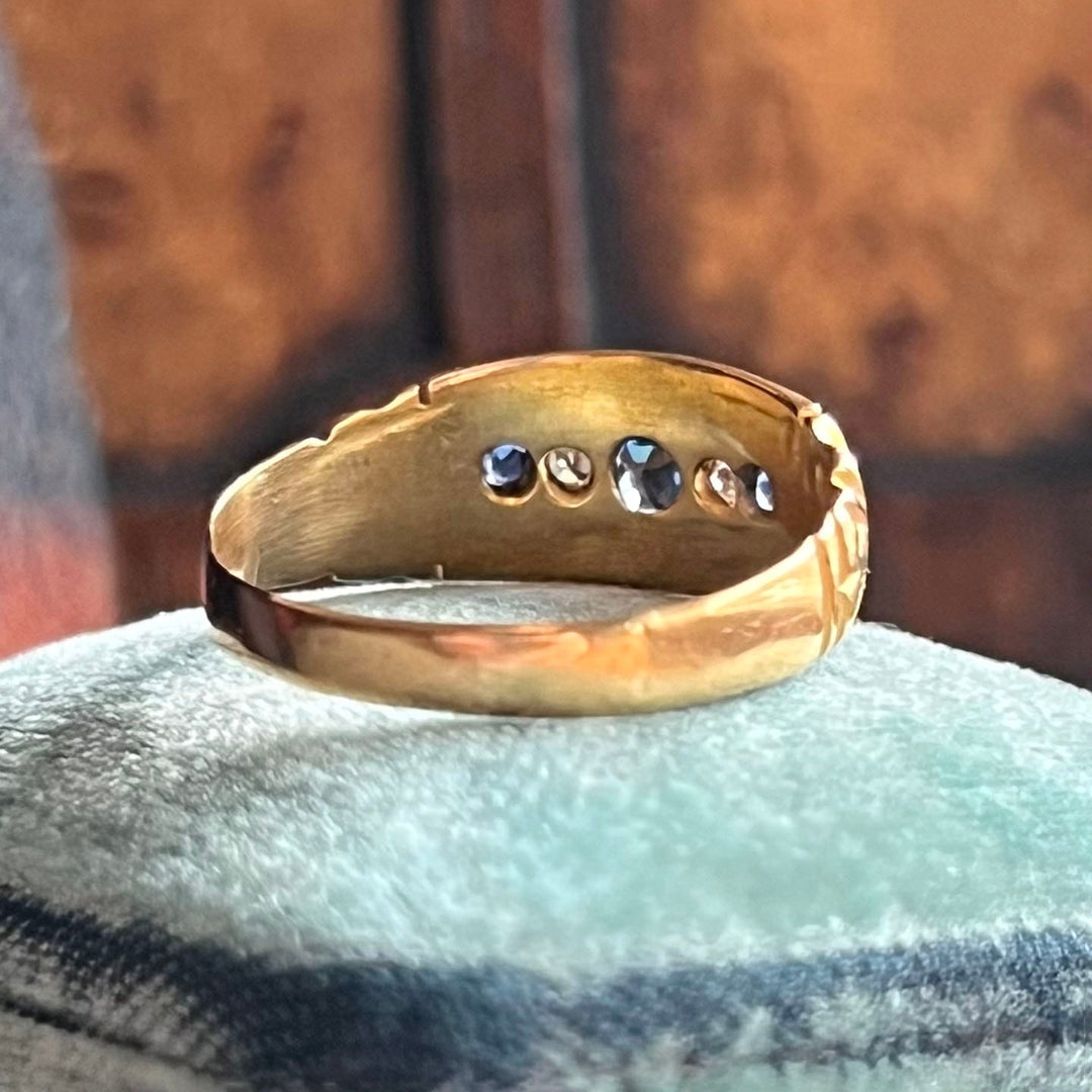 Edwardian sapphire diamond five stone ring angled view 18k gold