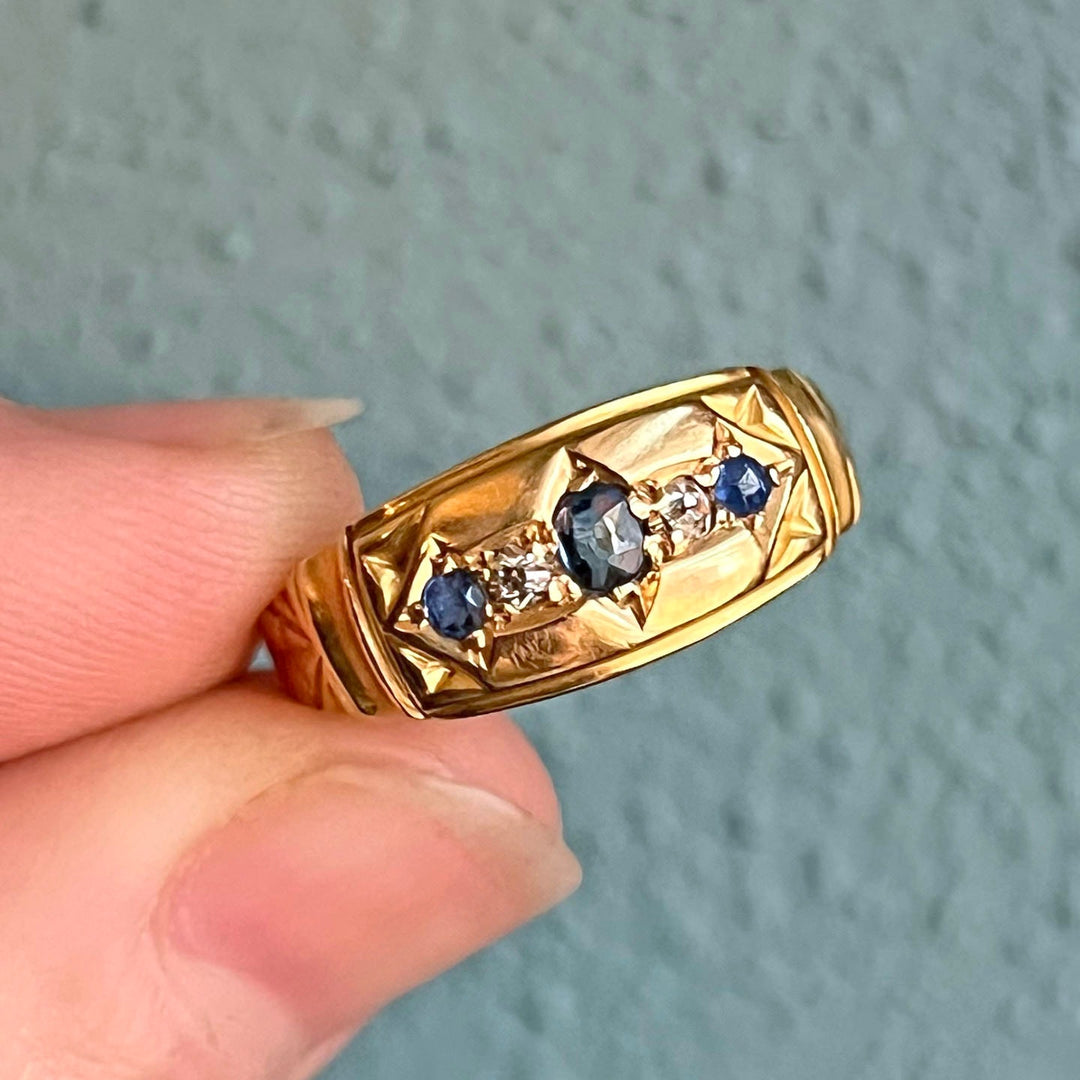 Close up sapphire and old cut diamond Edwardian ring