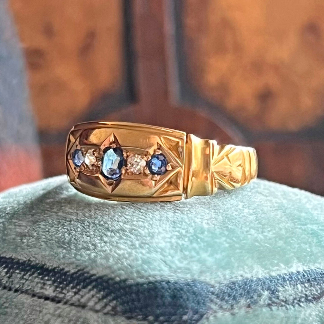 Edwardian sapphire diamond five stone ring angled view 18k gold