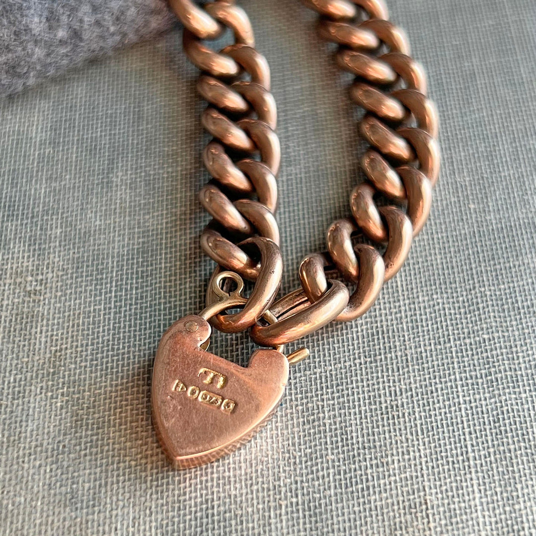 Close view of heart padlock clasp bracelet