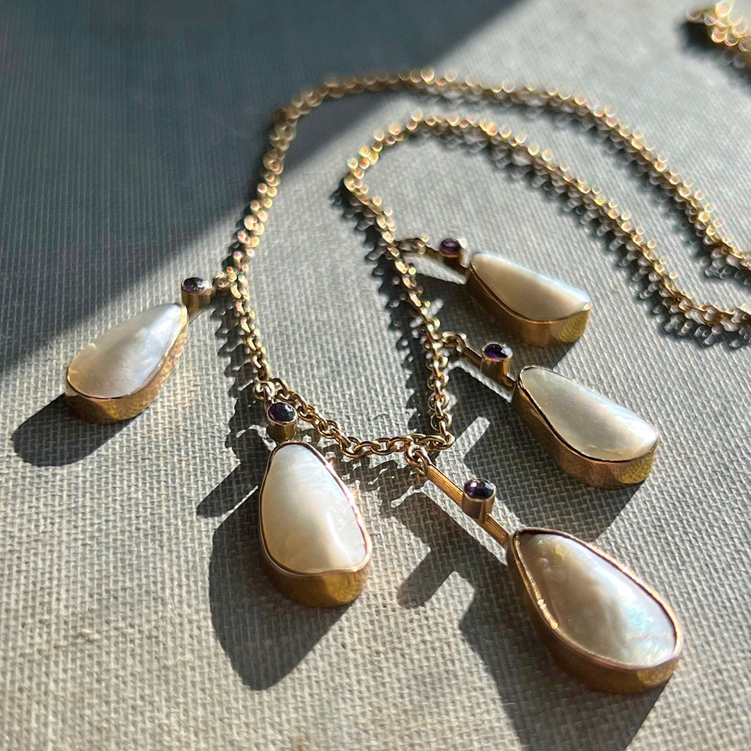 Close view of mother of pearl lavaliere pendant