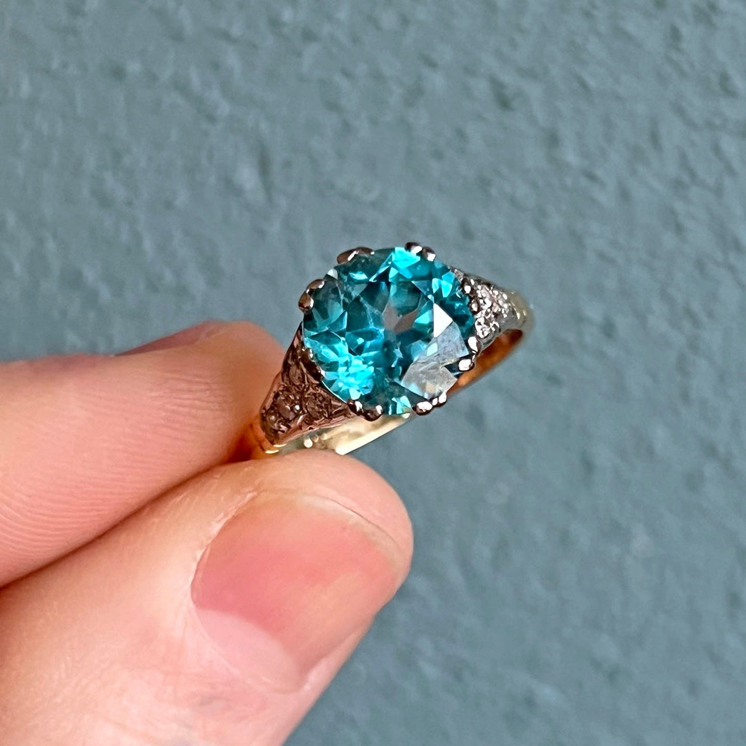 Close view of blue zircon and diamond ring
