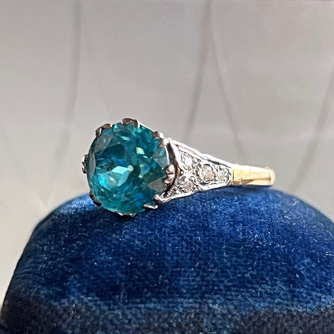 Antique zircon ring with diamond accents