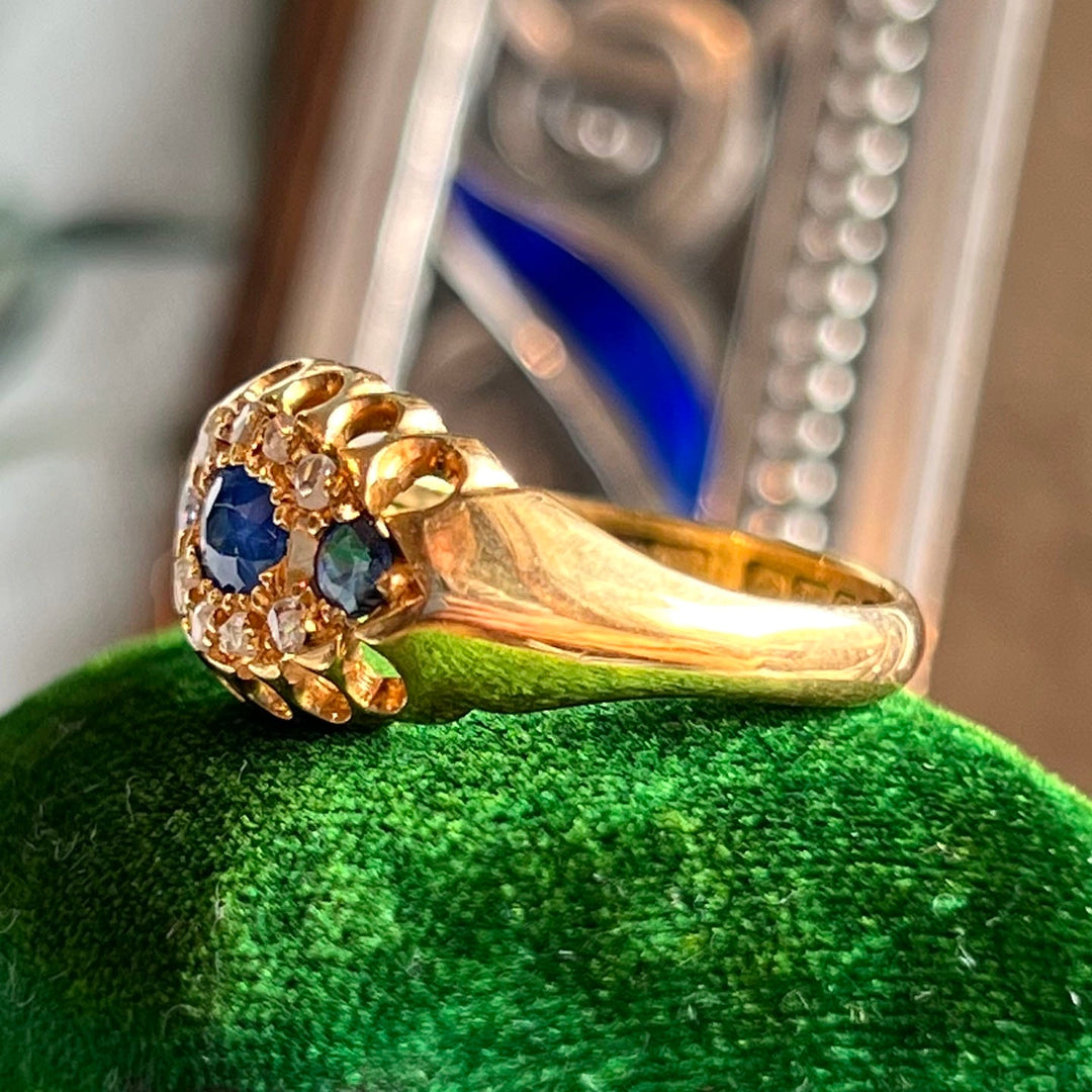 Side profile of sapphire diamond gold ring