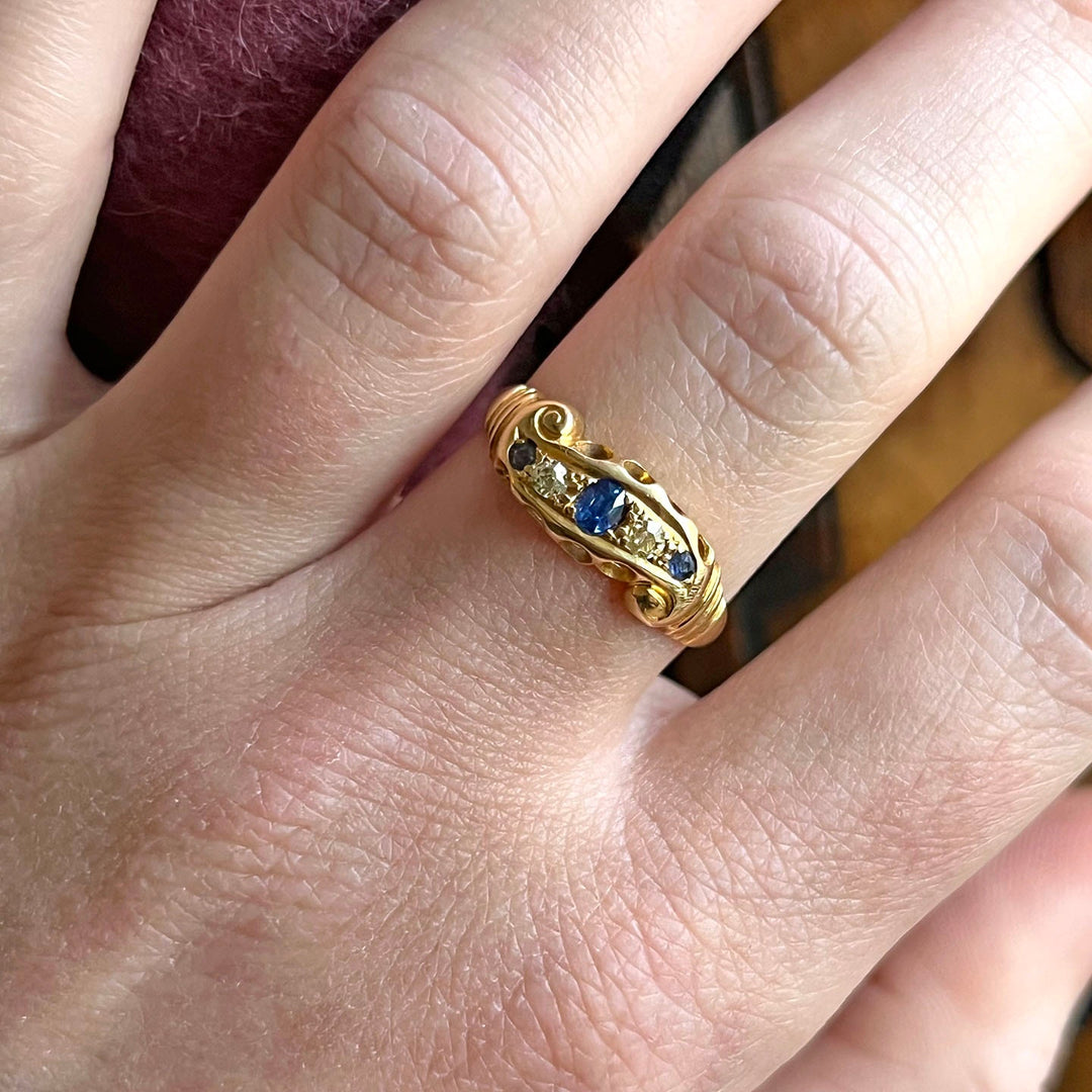Close view of alternating sapphire and diamond ring