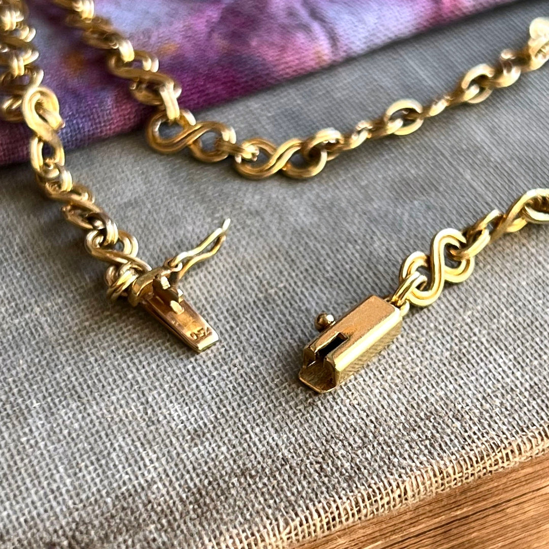 Antique gold long chain necklace close detail