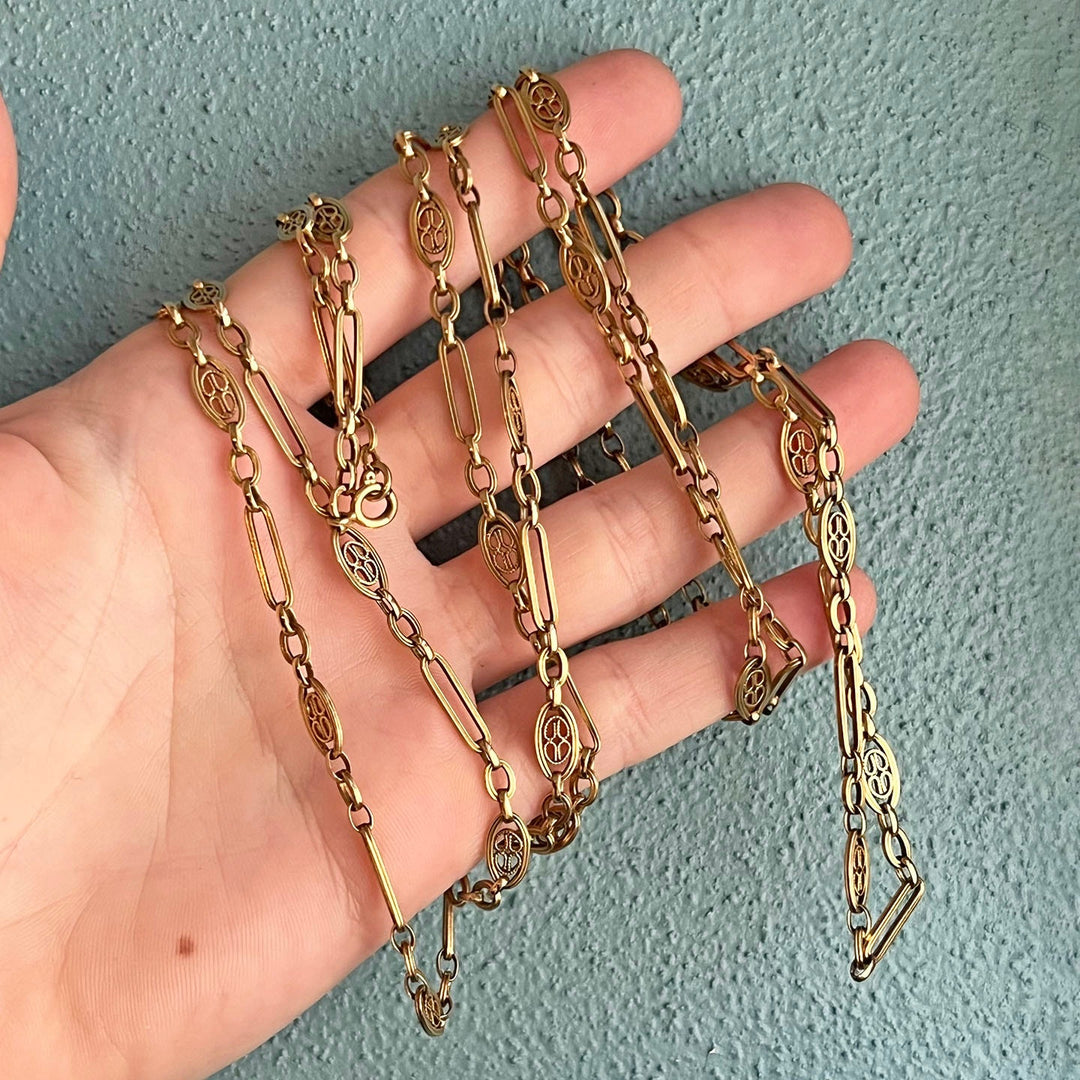 Detail of long link gold chain antique craftsmanship