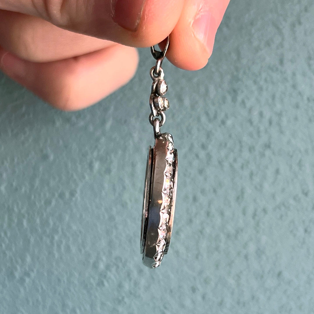 Side profile of antique paste locket